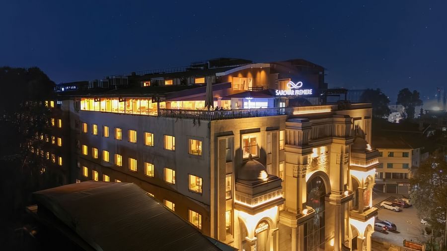 A Stunning night view of the illuminated hotel facade - Sarovar Premiere, Srinagar